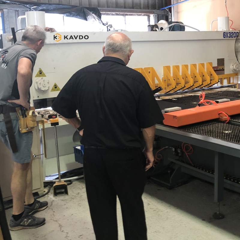 Customers with KAVDO Shearing Machine in workshop