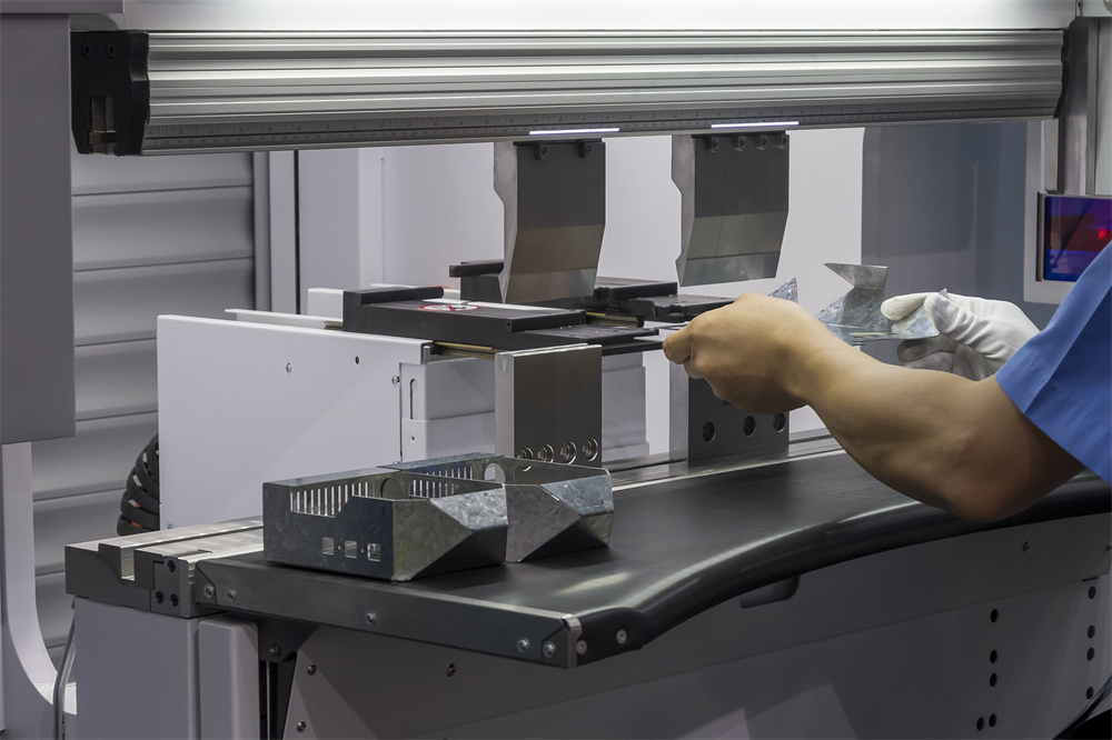 Close-up of CNC press brake backgauge and tooling
