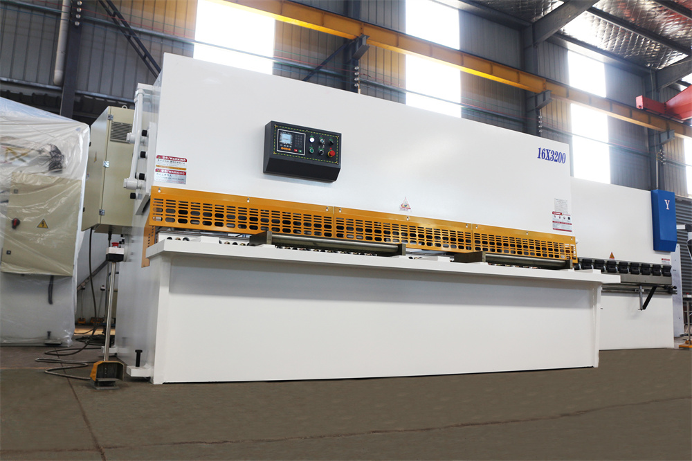 Close-up of a high-precision shearing machine operation